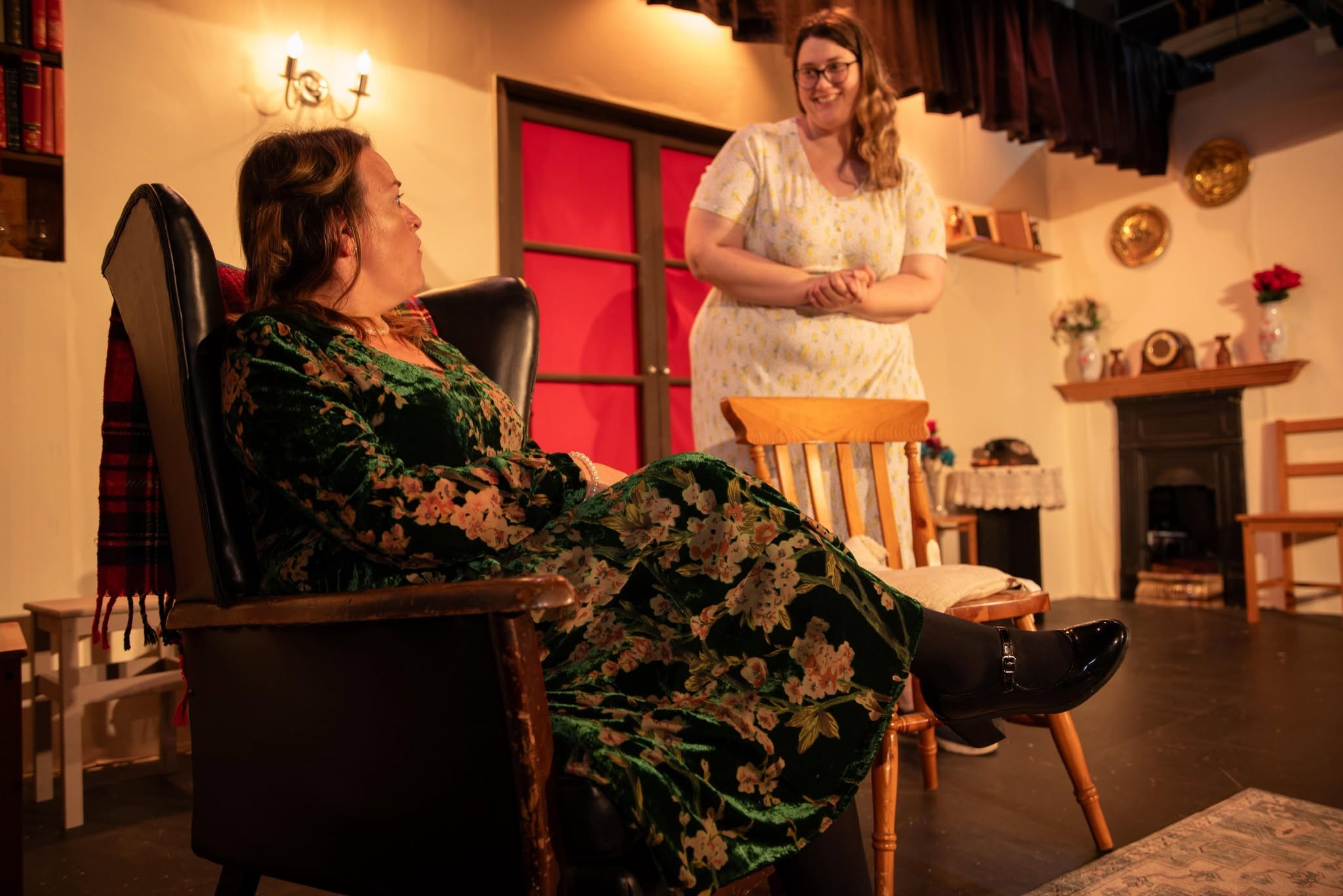 Two Blithe Spirit cast members perform a scene in the Condomines’ living room